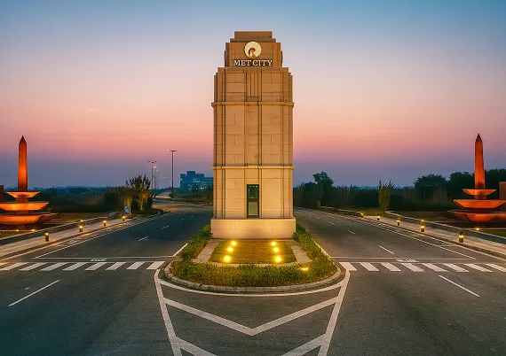 Reliance Met City Jhajjar Gurgaon integrated township plotted development main entrance landmark tower view by Reliance Industries Limited